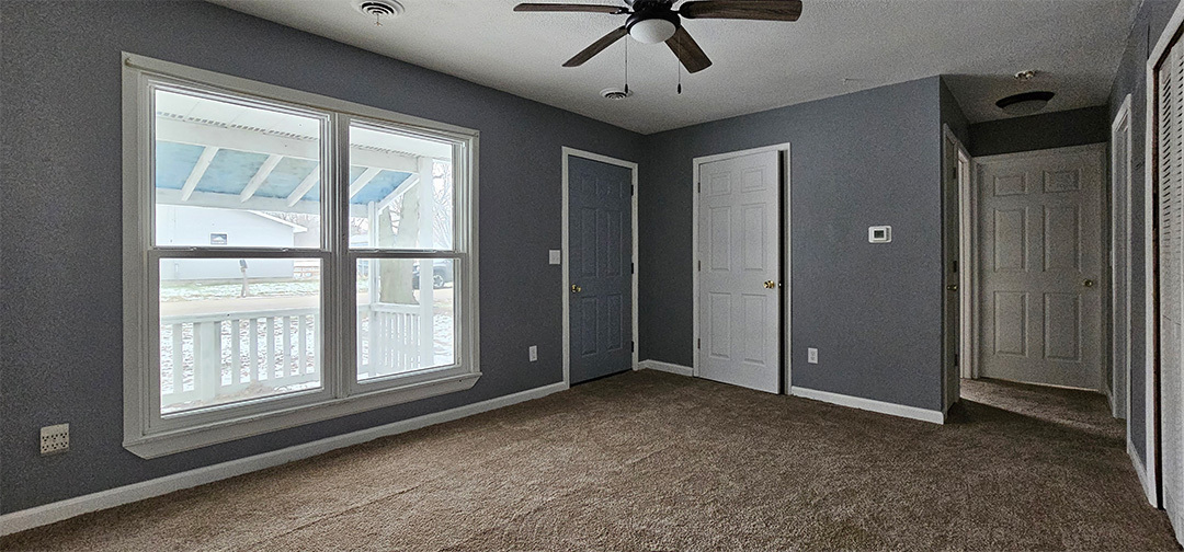 1702 West 9th Street Dixon, IL 61021 - Photo 3 of 9 a view of an empty room with a window