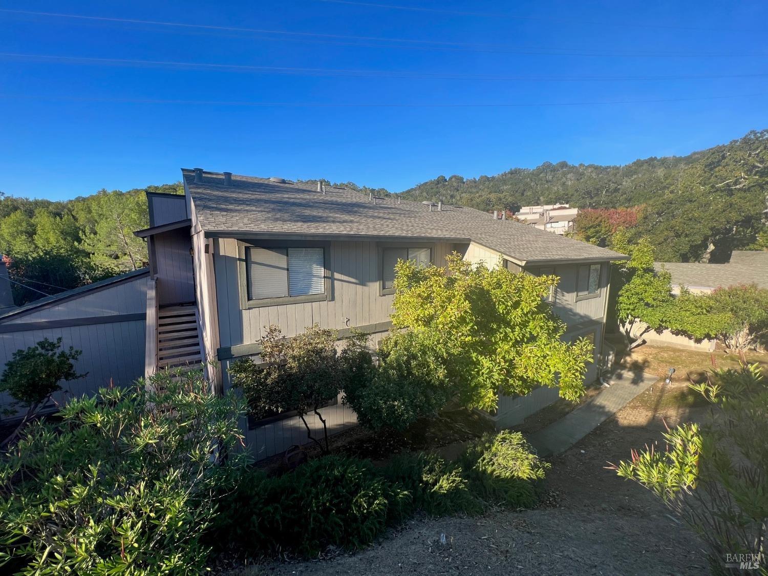 2 Grass Court Novato, CA 94949 - Photo 1 of 1 a front view of a house with a yard
