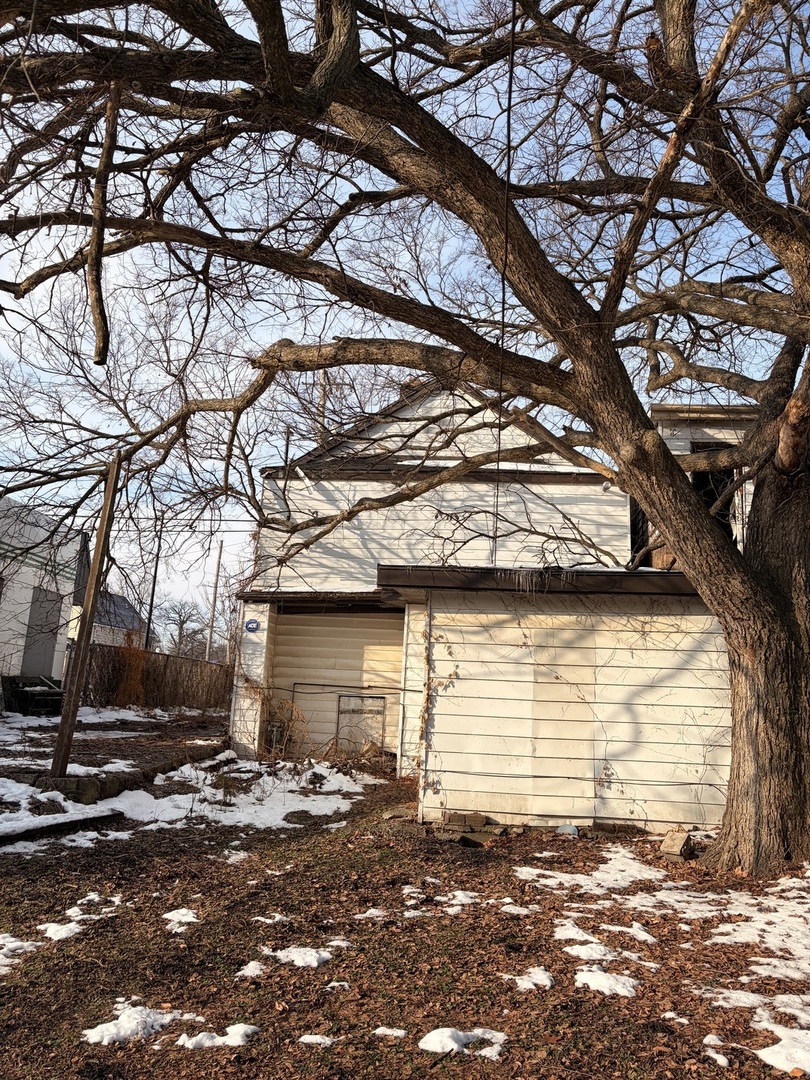 1901 Chicago Road Chicago Heights, IL 60411 - Photo 19 of 20 a view of a house with a yard
