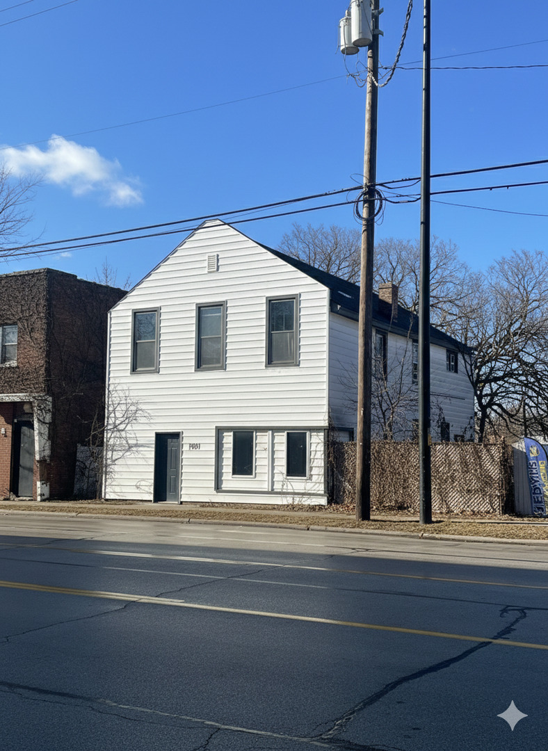 1901 Chicago Road Chicago Heights, IL 60411 - Photo 2 of 20 a view of a house with a street
