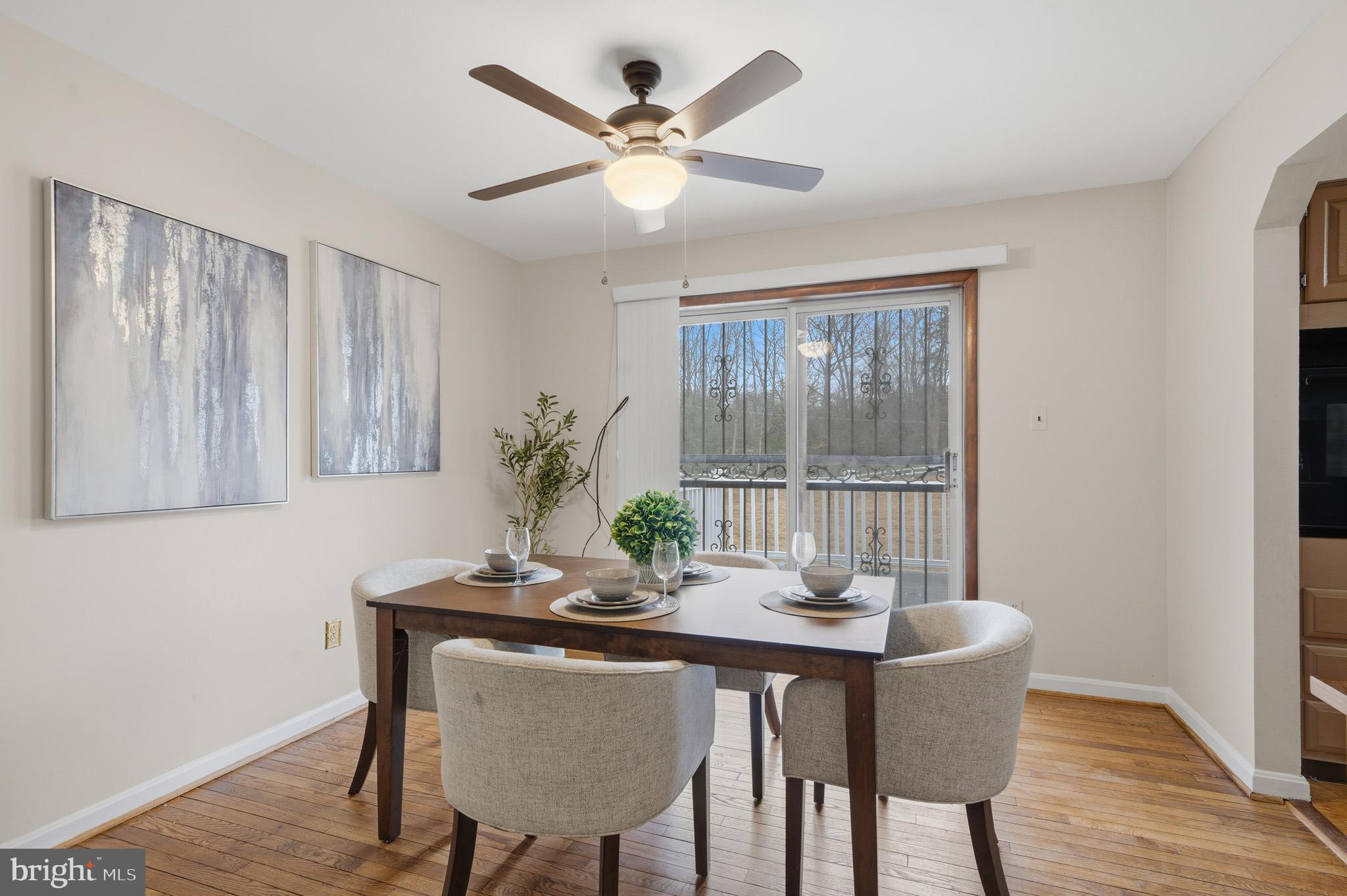 5253 Briscoe Farm Road Waldorf, MD 20601 - Photo 13 of 74 Dining room w/ natural light from slider to deck
