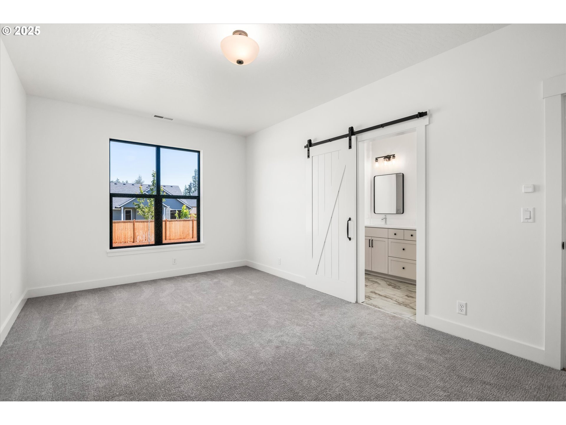 88139 Jameson Way Veneta, OR 97487 - Photo 11 of 26 a view of an empty room with a window