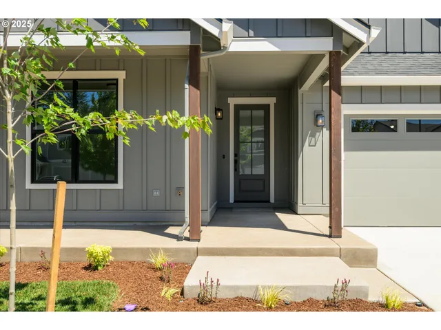 a view of a house with a garden