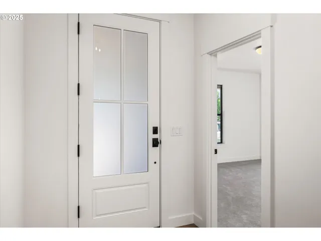 a view of a bathroom with mirror