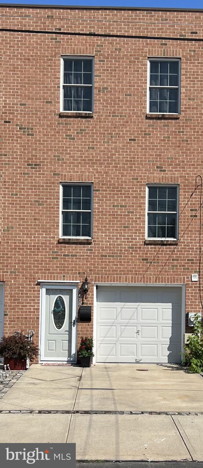 a brick house with a door