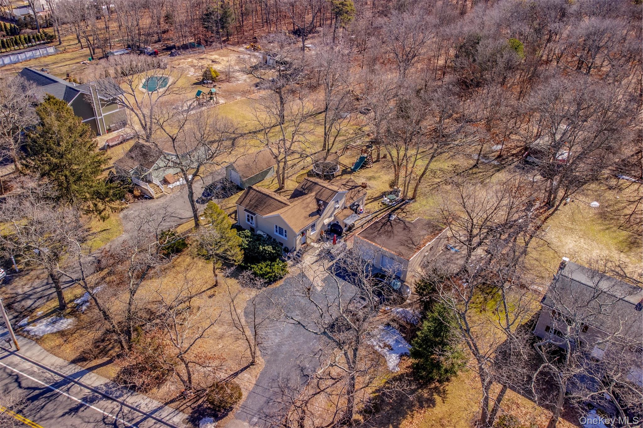 556 Hawkins Road Selden, NY 11784 - Photo 3 of 12 an aerial view of residential house with outdoor space