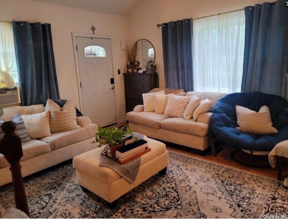 556 Hawkins Road Selden, NY 11784 - Photo 5 of 12 a living room with furniture rug and window