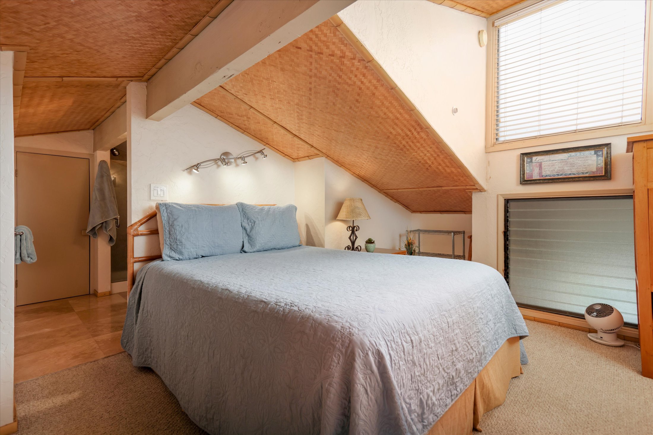 68-1771 Melia Street, Unit G214 Waikoloa, HI 96738 - Photo 22 of 29 a bedroom with a bed and a cabinets