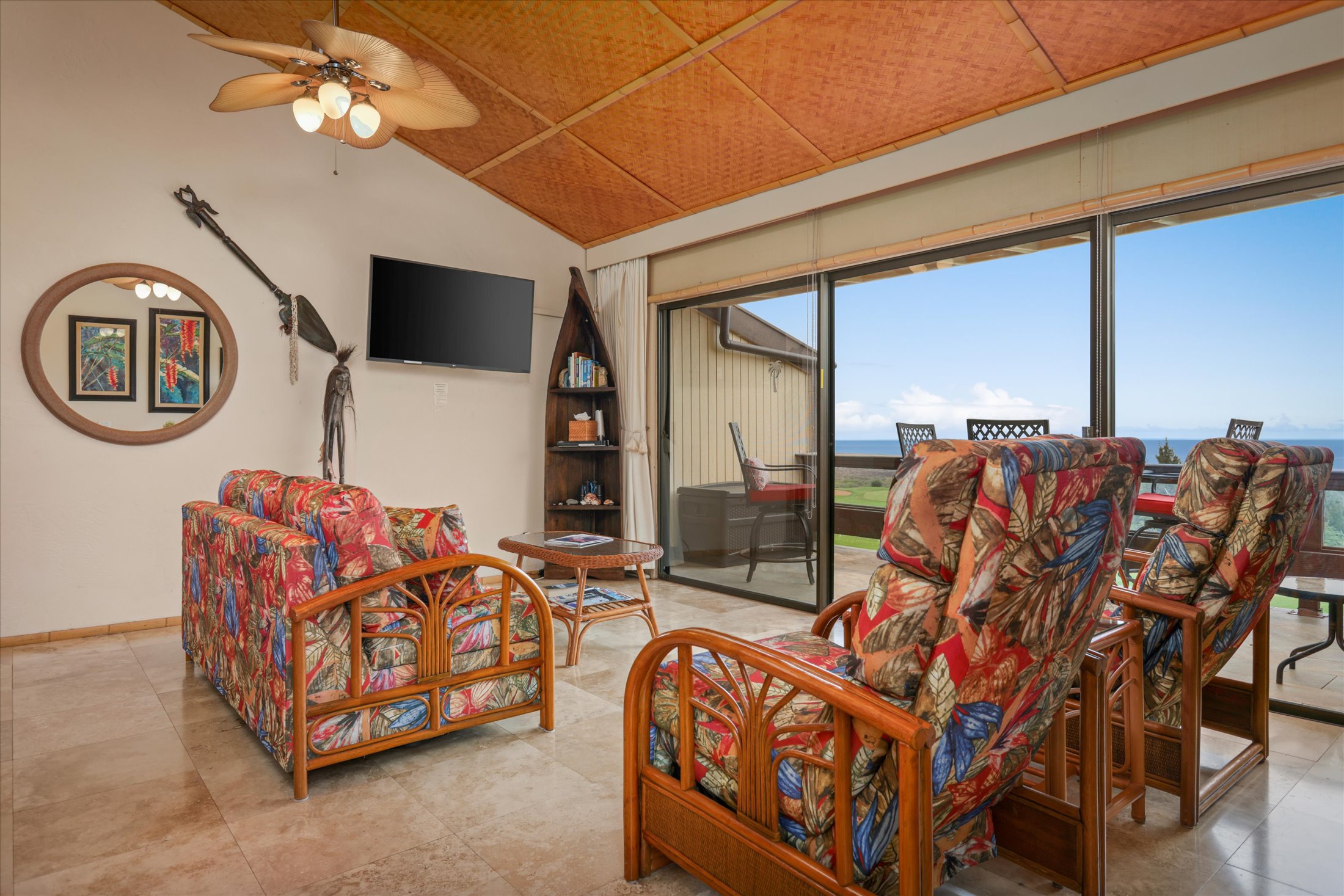 68-1771 Melia Street, Unit G214 Waikoloa, HI 96738 - Photo 8 of 29 a living room with furniture a flat screen tv and a large window