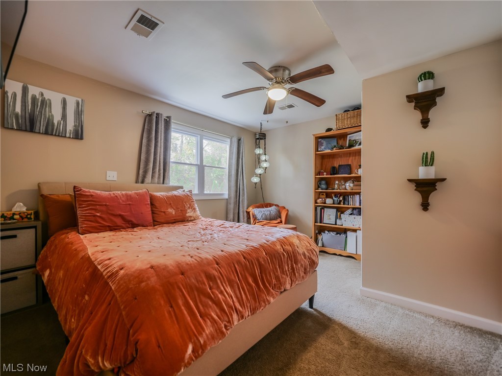 1240 Churchill Road Lyndhurst, OH 44124 - Photo 11 of 30 Carpeted bedroom featuring ceiling fan