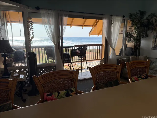 a bedroom with bed and wooden floor