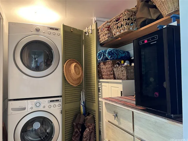 a view of ocean with a palm tree