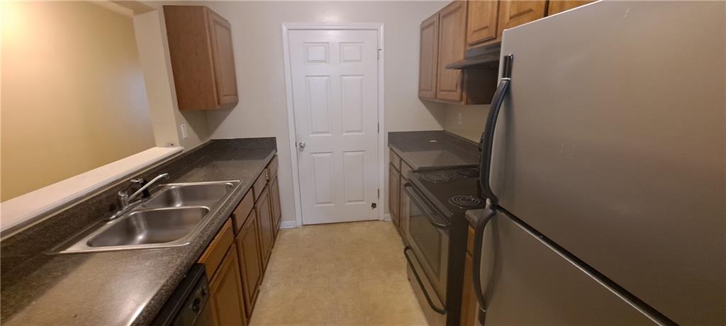 8304 Fairington Ridge Circle Lithonia, GA 30038 - Photo 7 of 14 a bathroom with a sink a toilet and a shower