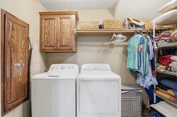 a utility room with dryer and washer