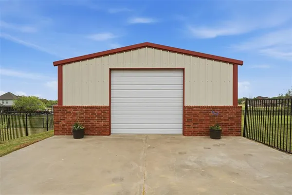 a front view of a house with a garage