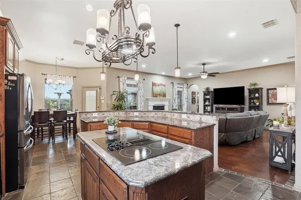 a kitchen with a table and chairs in it