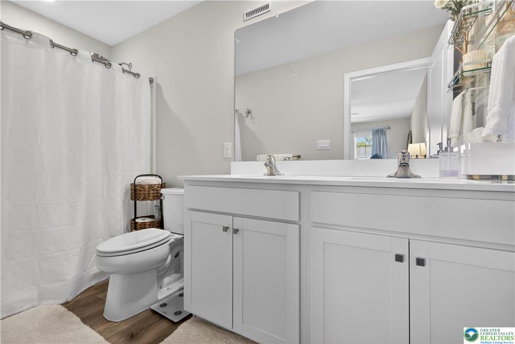 1274 Martin Road Breinigsville, PA 18031 - Photo 12 of 18 Clean lines and a spacious double vanity define this modern bathroom design.