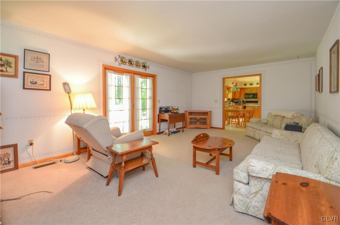 375 Woodline Road Nazareth, PA 18064 - Photo 2 of 22 a living room with furniture and a window