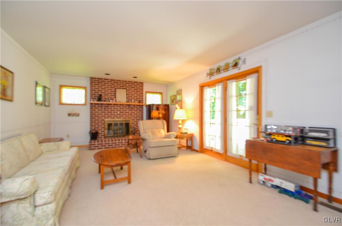 375 Woodline Road Nazareth, PA 18064 - Photo 3 of 22 a living room with furniture and a fireplace