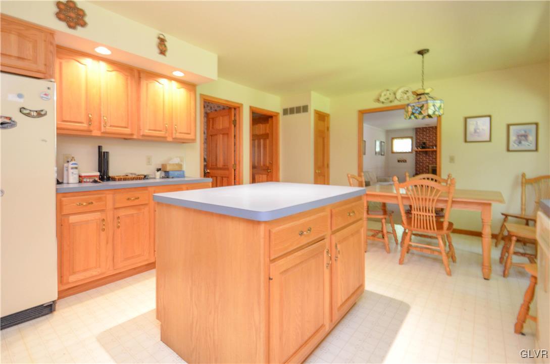 375 Woodline Road Nazareth, PA 18064 - Photo 5 of 22 a dining hall with stainless steel appliances granite countertop a sink a stove and a refrigerator