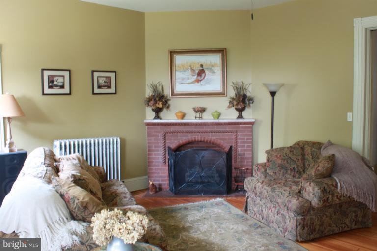 6948 North Clifton Road Frederick, MD 21702 - Photo 20 of 30 Living Room w/Gas-Converted Fireplace