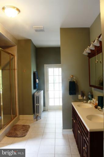 6948 North Clifton Road Frederick, MD 21702 - Photo 6 of 30 Master Bath w/Enclosed Porch