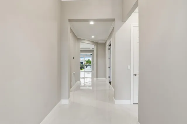a view of hallway with livingroom