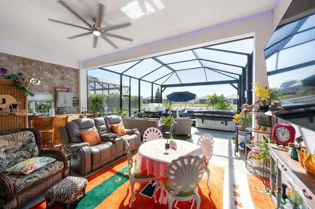 a view of a balcony with a table and chairs