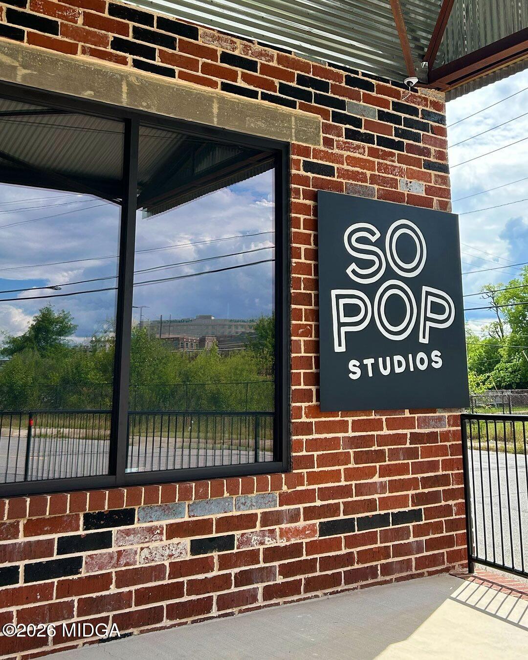 a view of a door and wooden street