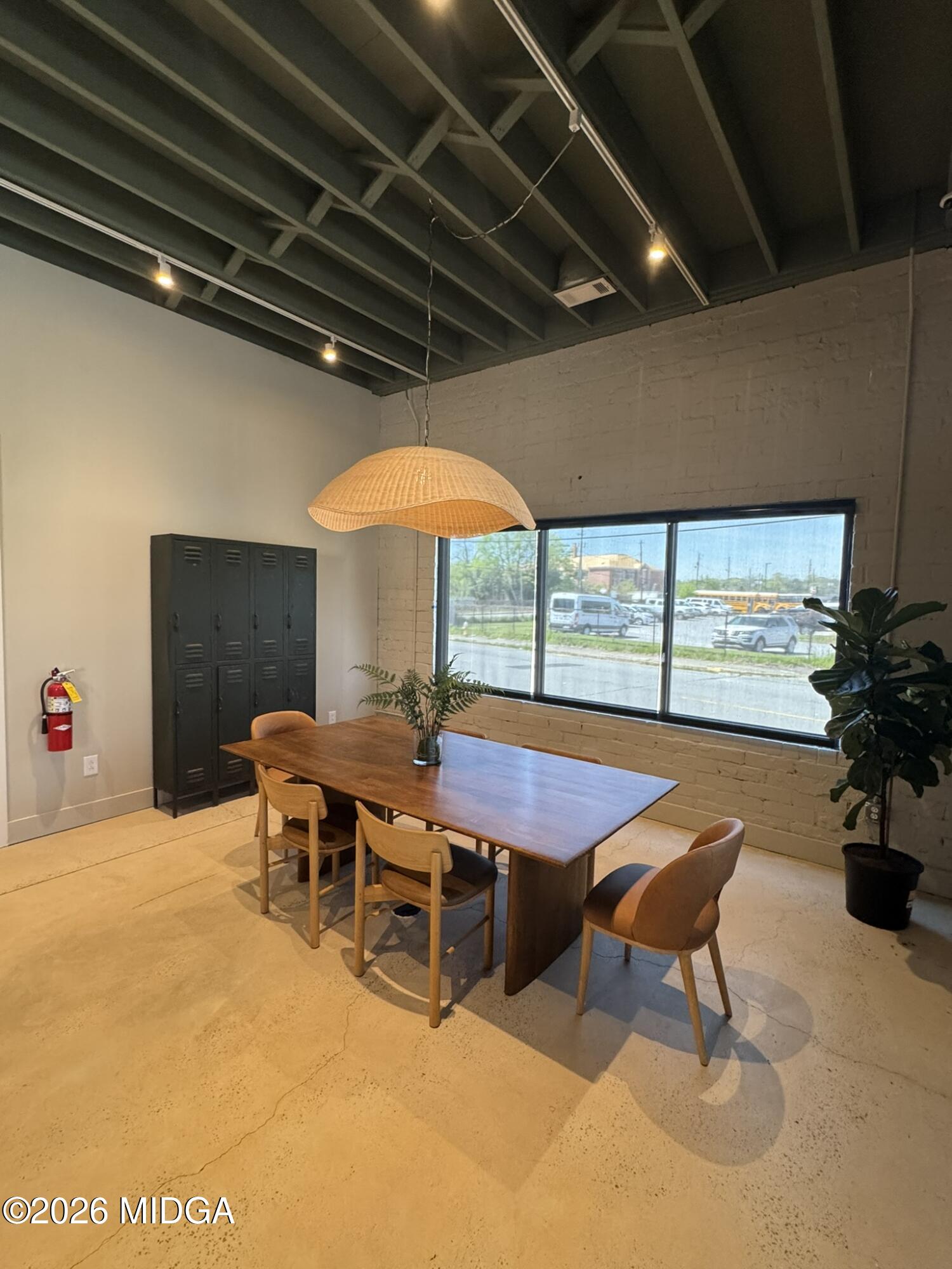 1080 3rd Street Macon, GA 31201 - Photo 13 of 18 a patio with table and chairs