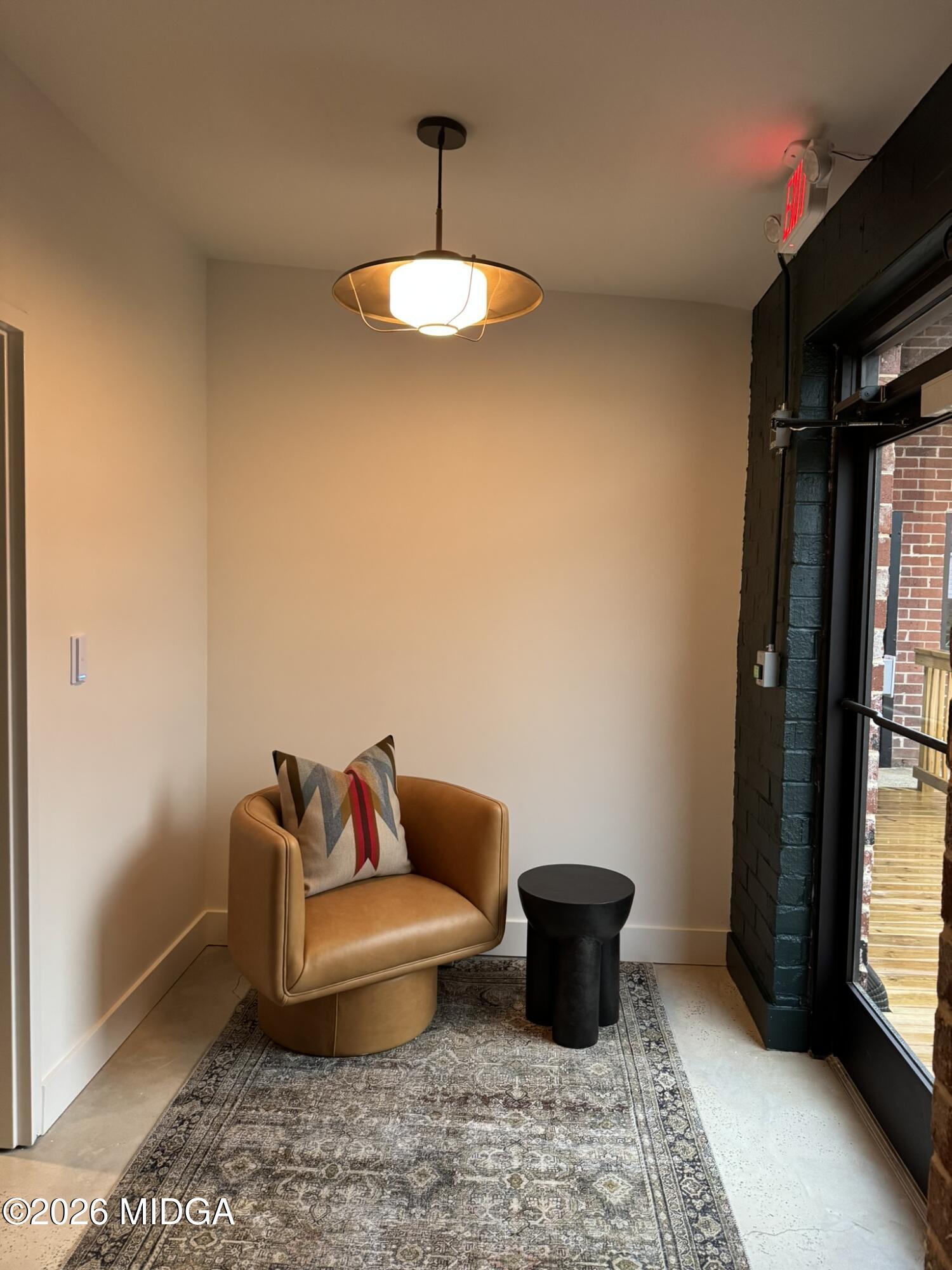 1080 3rd Street Macon, GA 31201 - Photo 16 of 18 a living room with furniture and a window