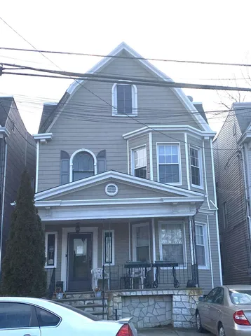 a front view of a house with balcony