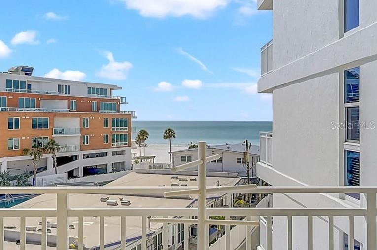 6518 Midnight Pass Road, Unit 407 Sarasota, FL 34242 - Photo 1 of 48 a view of a kitchen with stainless steel appliances and cabinets