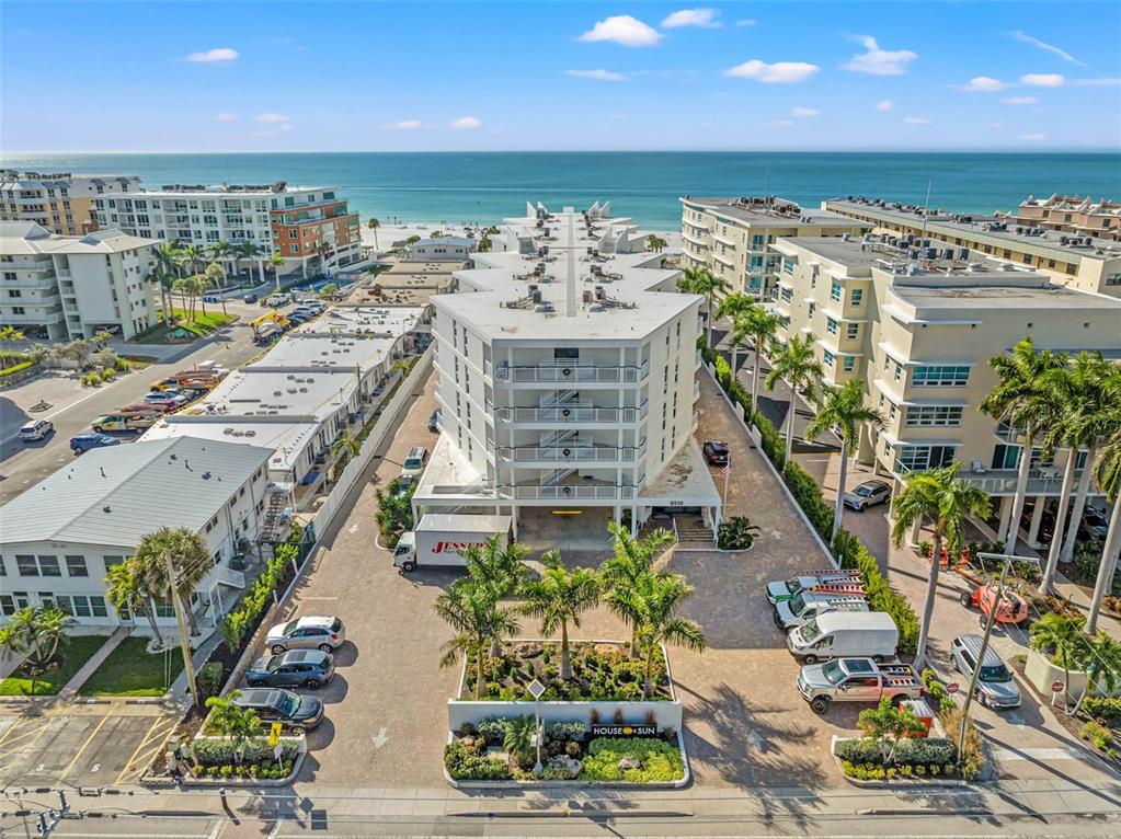 6518 Midnight Pass Road, Unit 407 Sarasota, FL 34242 - Photo 2 of 48 a view of a city with tall buildings