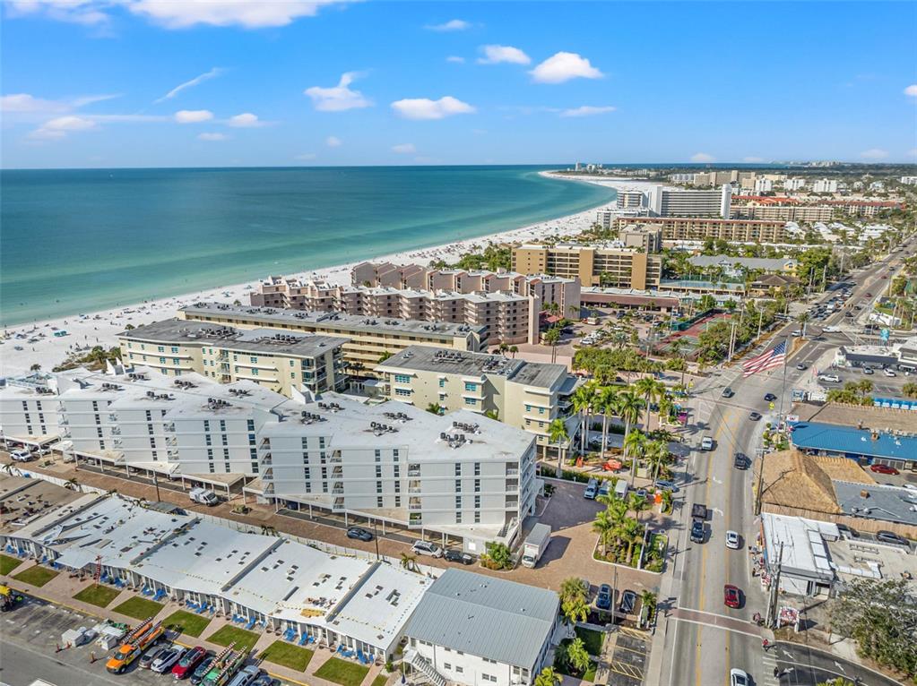 6518 Midnight Pass Road, Unit 407 Sarasota, FL 34242 - Photo 8 of 48 a view of building with an ocean view