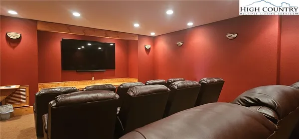 a view of a yard with wooden fence