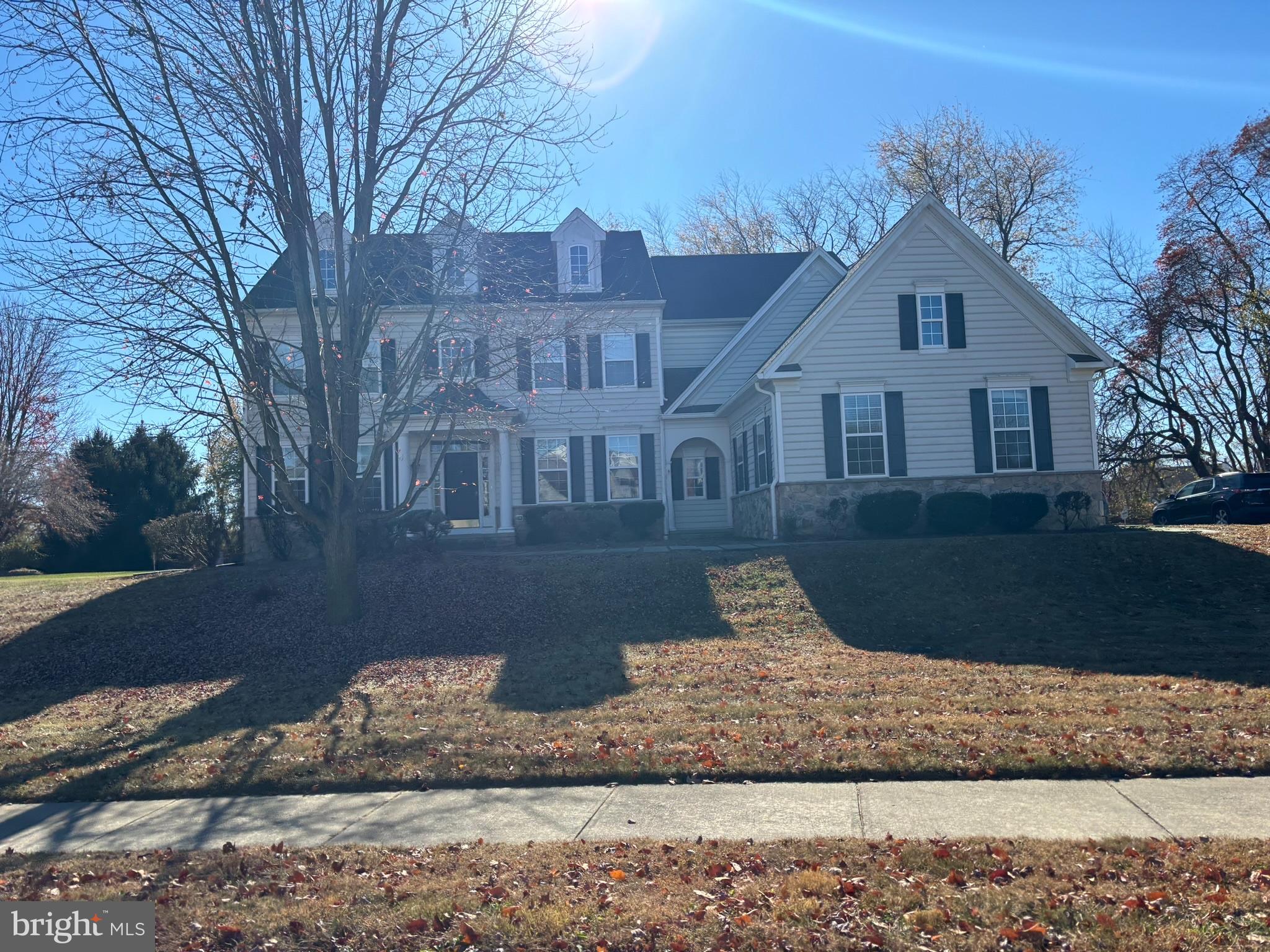208 Glenshane Pass Bear, DE 19701 - Photo 3 of 24 a front view of a house with a yard