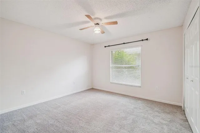 a bathroom with a sink toilet and a mirror