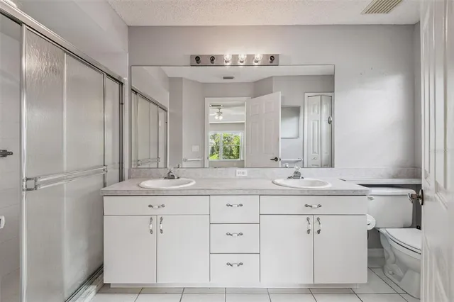 a view of a swimming pool with a sitting space