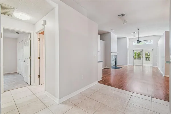 a view of an empty room with a window