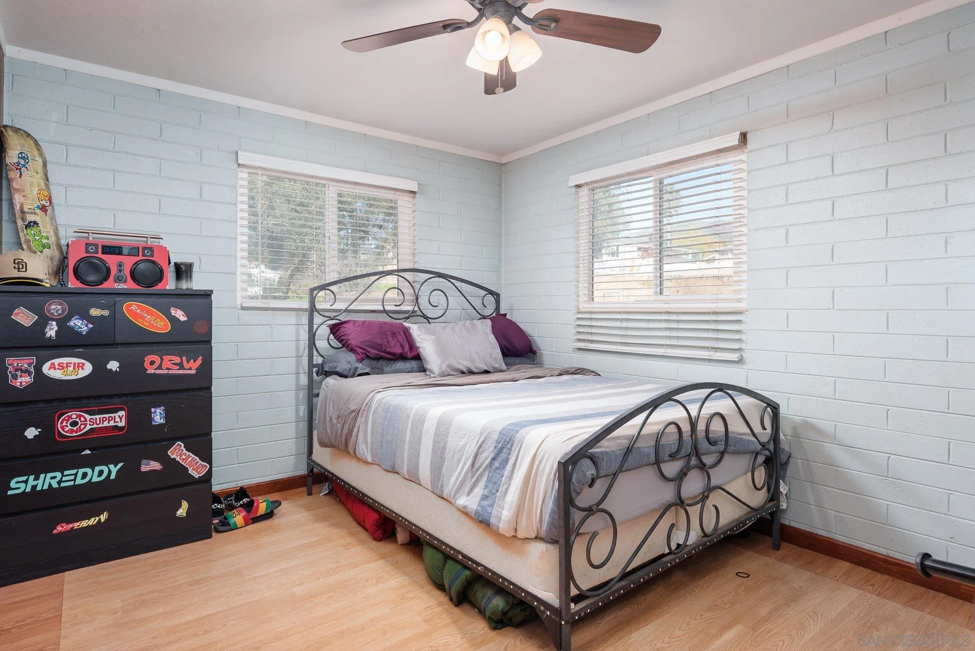 1241 Marshall Road Alpine, CA 91901 - Photo 11 of 21 a bedroom with a bed and a chandelier