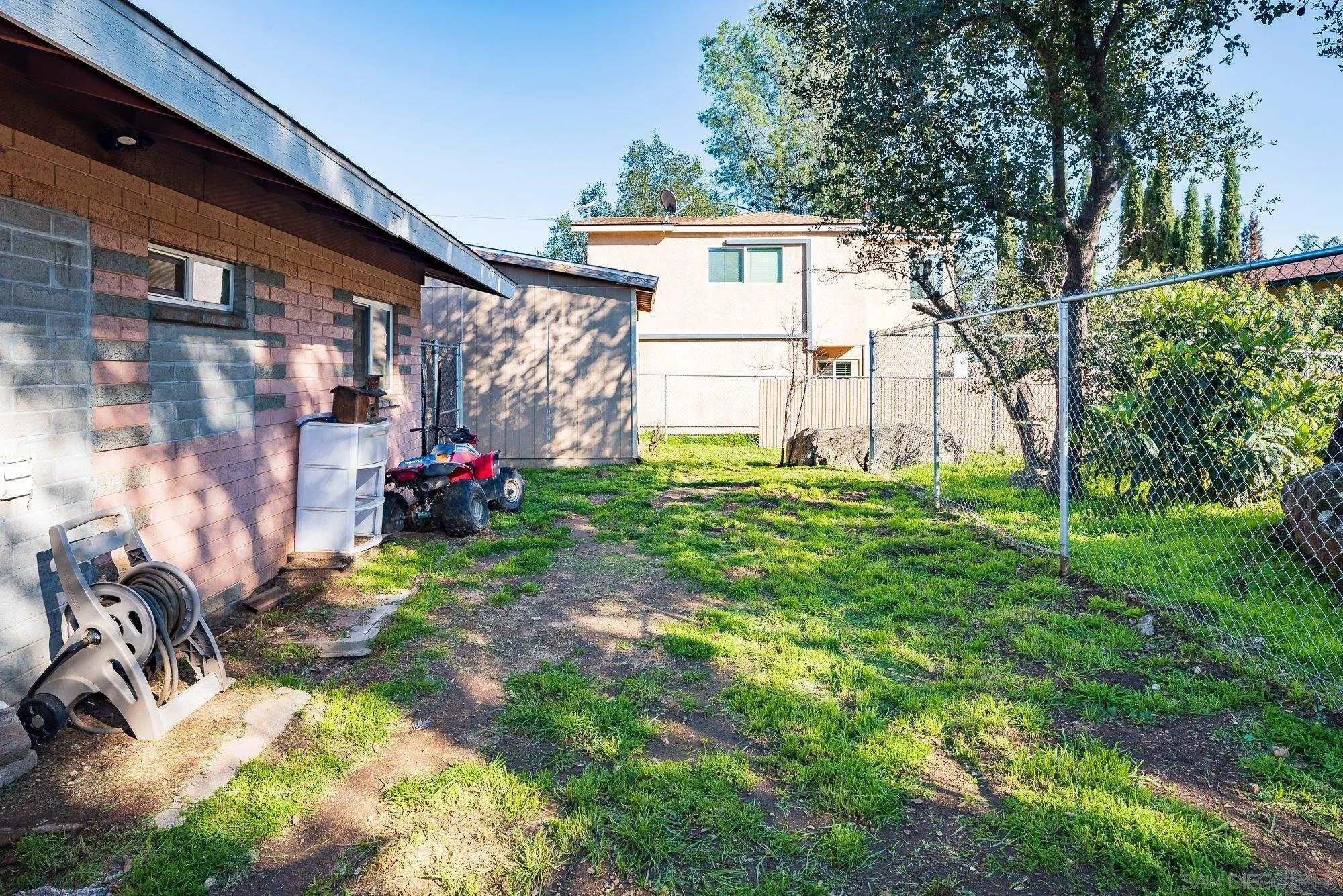 1241 Marshall Road Alpine, CA 91901 - Photo 15 of 21 a view of backyard with garden and trees