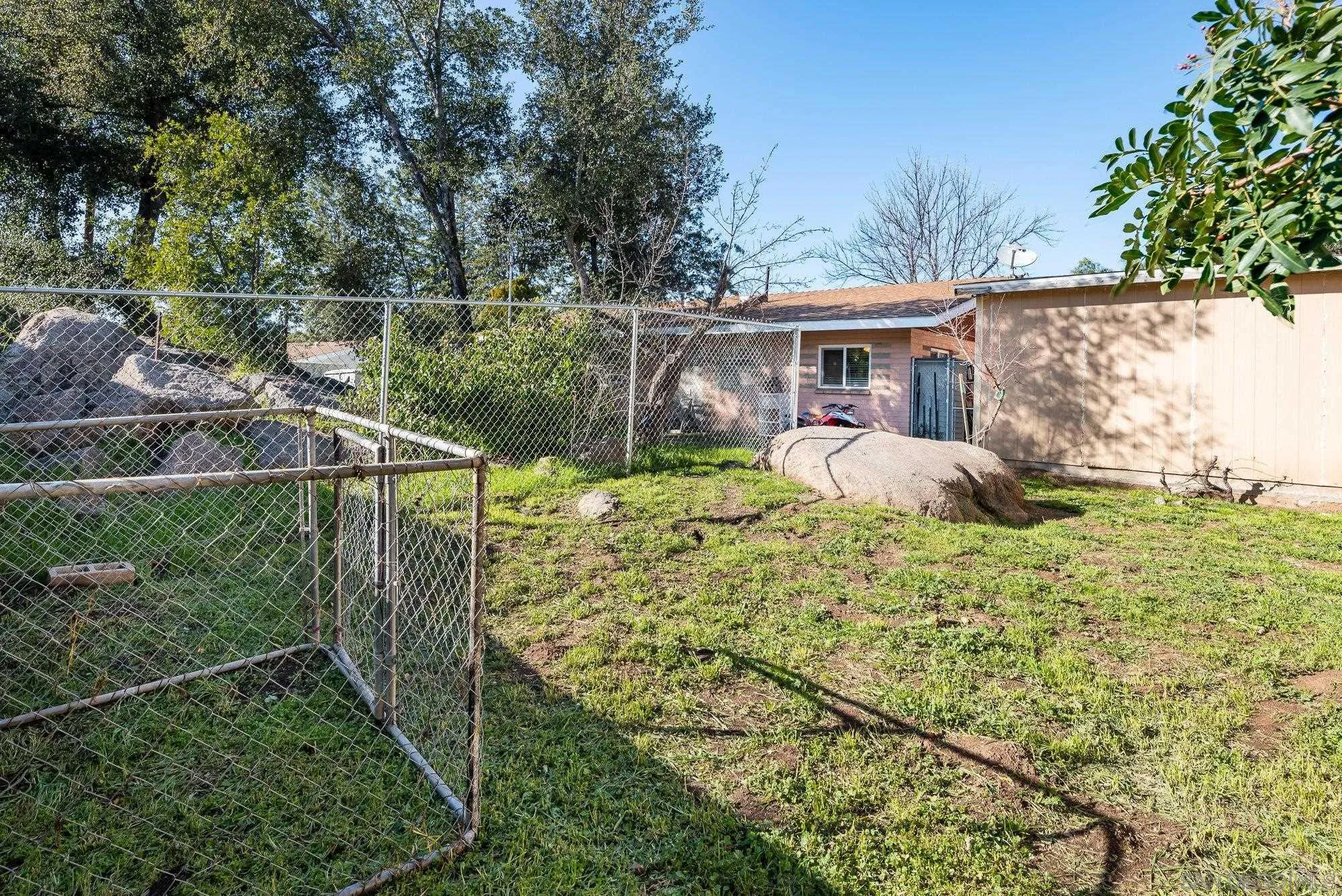 1241 Marshall Road Alpine, CA 91901 - Photo 16 of 21 a house view with a backyard space