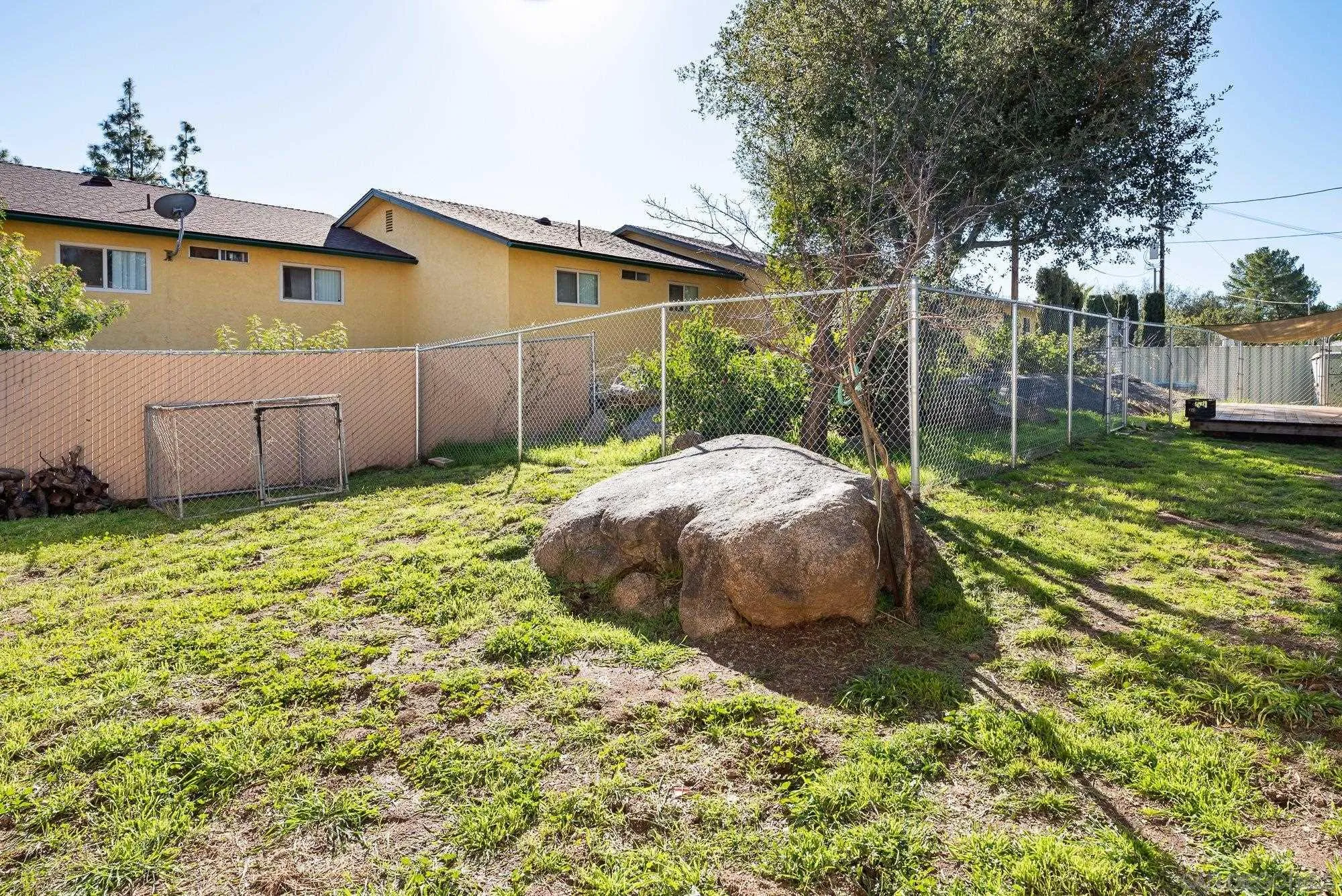 1241 Marshall Road Alpine, CA 91901 - Photo 17 of 21 a backyard of a house with table and chairs