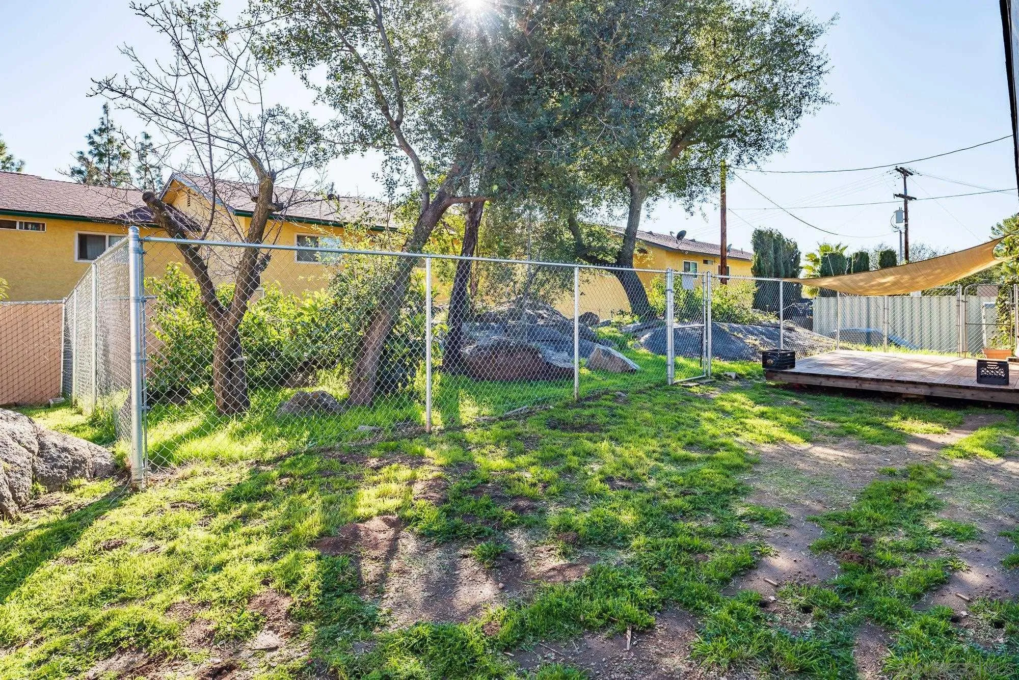 1241 Marshall Road Alpine, CA 91901 - Photo 18 of 21 a view of a garden with a slide
