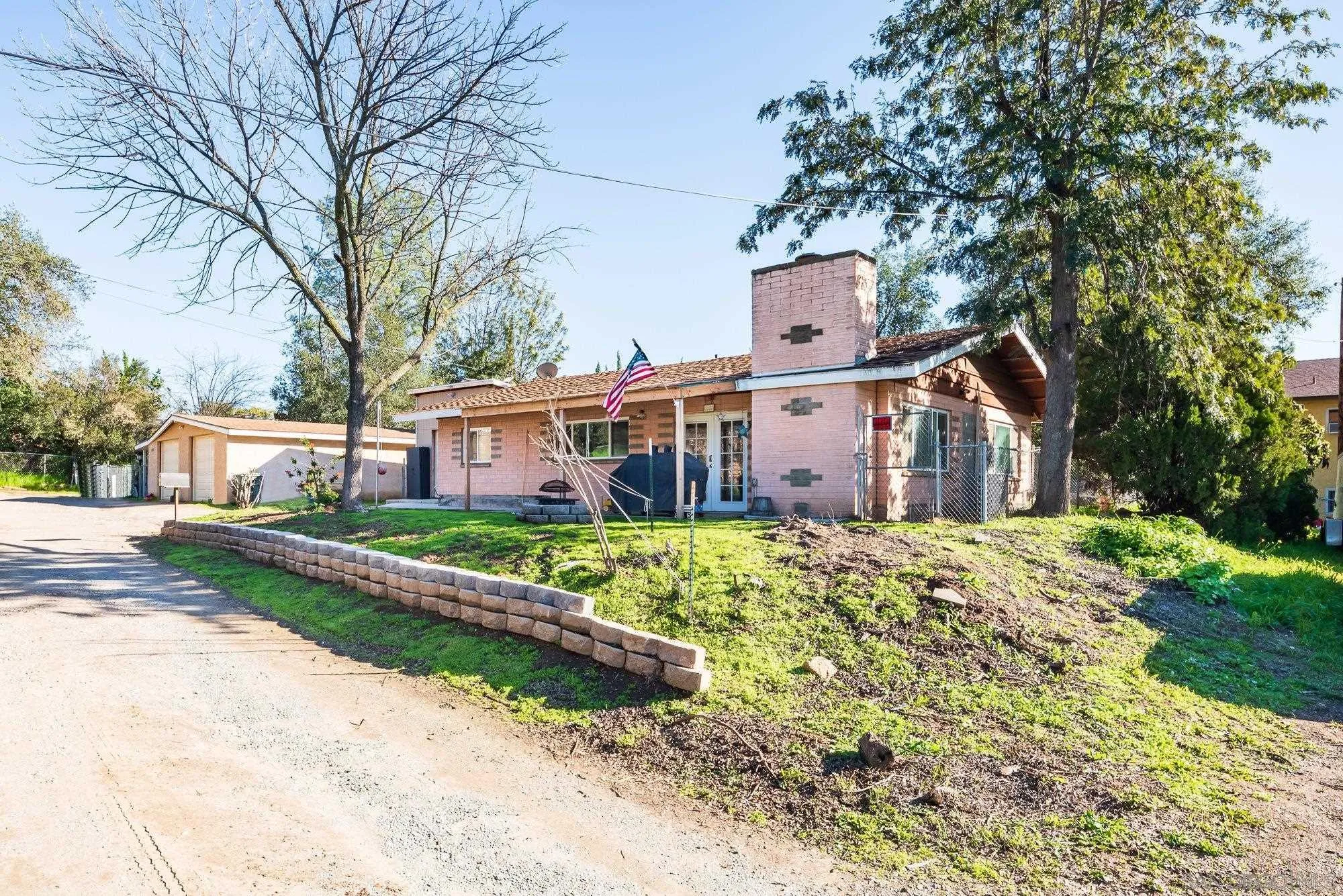 1241 Marshall Road Alpine, CA 91901 - Photo 21 of 21 a view of a house with a yard and large tree