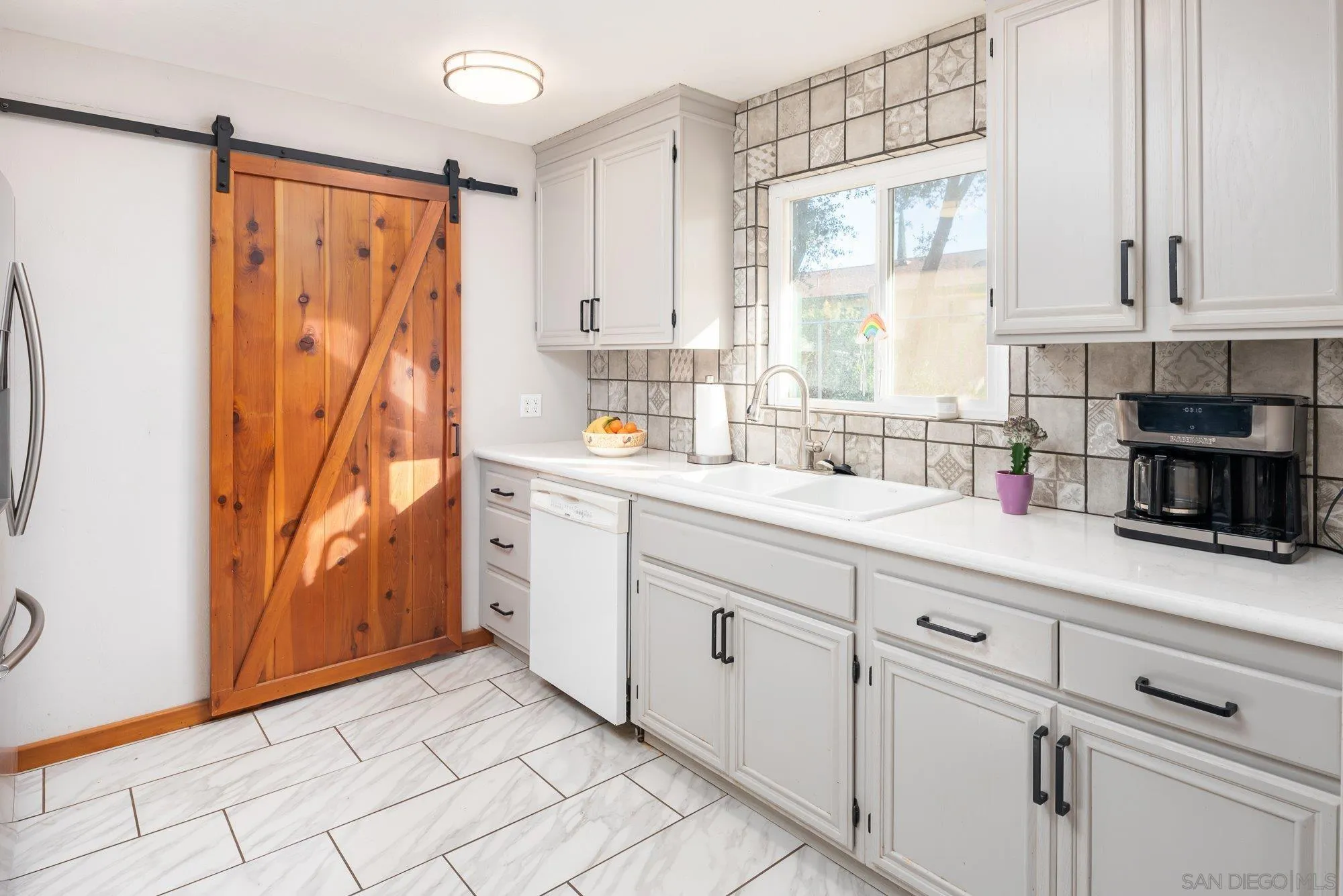 1241 Marshall Road Alpine, CA 91901 - Photo 8 of 21 a kitchen with appliances cabinets and a window