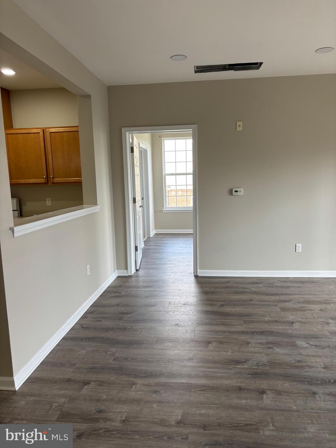 1321 Sierra Drive Hamilton, NJ 08619 - Photo 18 of 33 a view of a kitchen with a sink and dishwasher wooden floor