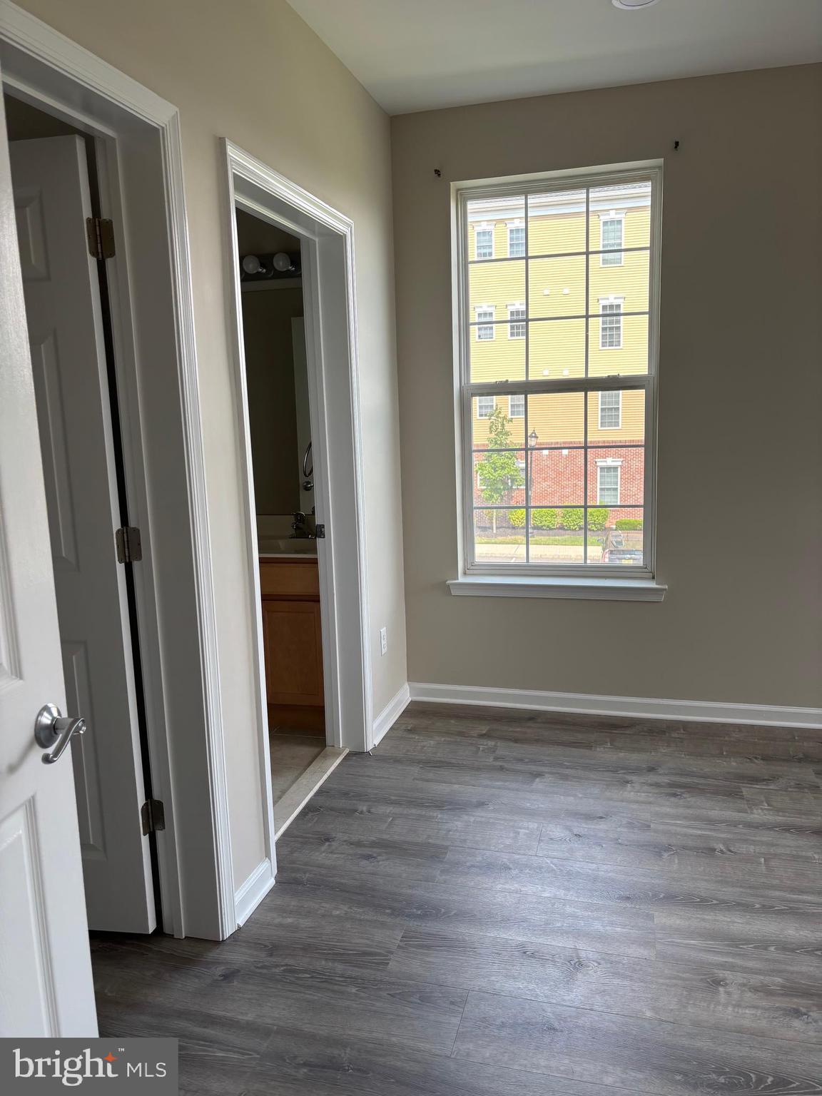 1321 Sierra Drive Hamilton, NJ 08619 - Photo 20 of 33 an empty room with wooden floor and a window