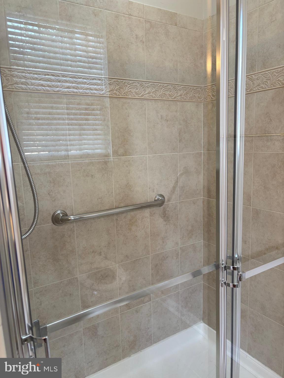 1321 Sierra Drive Hamilton, NJ 08619 - Photo 23 of 33 a bathroom with a glass shower door